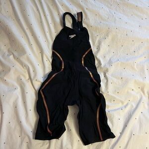 Speedo Black Tech Suit with Gold Accents